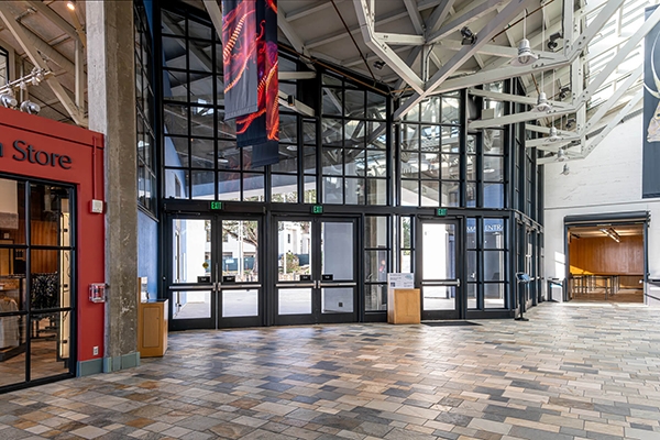 View of the glass exit doors from the main lobby of the Aquarium that leads outside to the front entrance