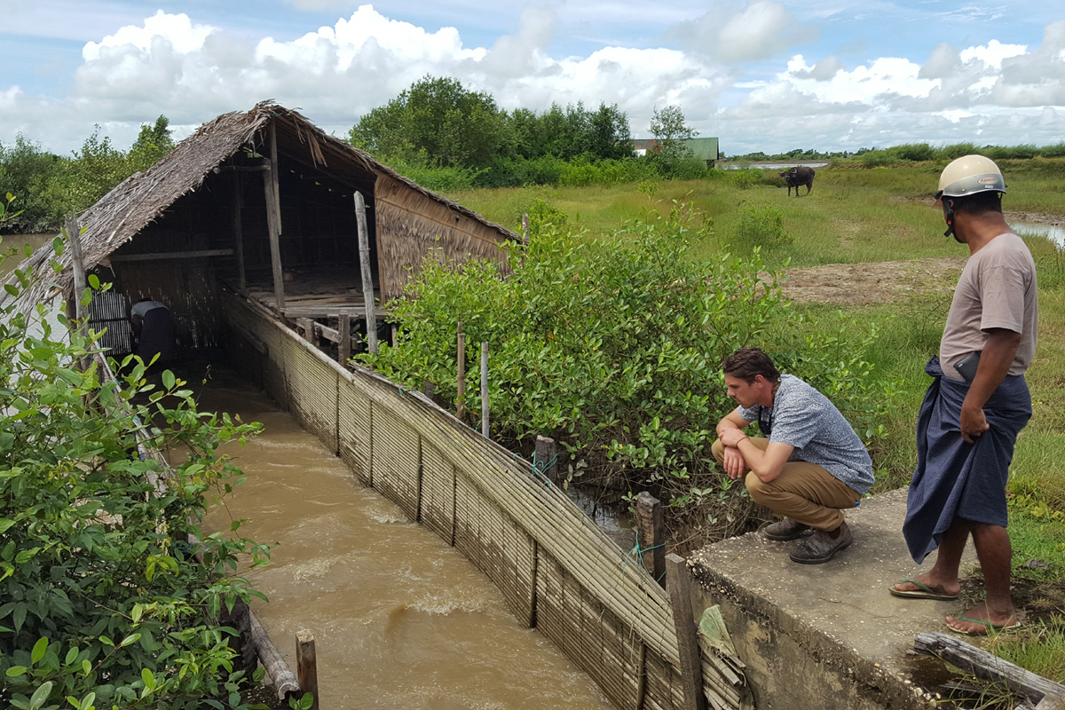 Monterey Bay Aquarium staff observe a shrimp farm in Vietnam.